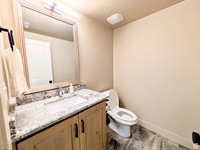 251 N Summit Dr, Beaver, UT 84713 - bathroom featuring a textured ceiling and vanity