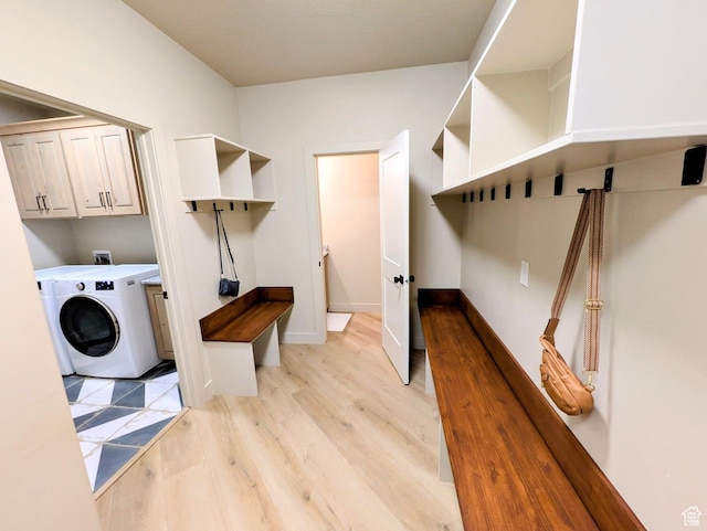 251 N Summit Dr, Beaver, UT 84713 - washroom with cabinet space, washer / clothes dryer, and light wood-type flooring
