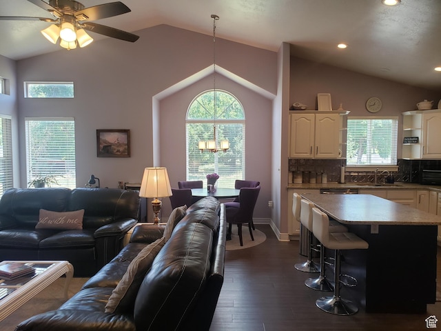 62 S 100 E, Kaysville, UT 84037 - living area featuring vaulted ceiling, healthy amount of natural light, ceiling fan, dark wood-style floors, and recessed lighting