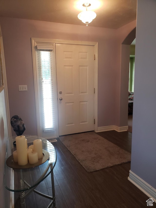 62 S 100 E, Kaysville, UT 84037 - entrance foyer with arched walkways and dark wood finished floors