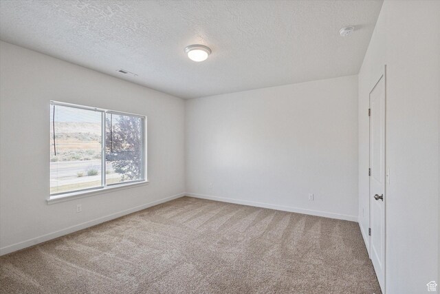 1011 W Lapis Fields Way S, Bluffdale, UT 84065 - carpeted empty room with a textured ceiling and baseboards