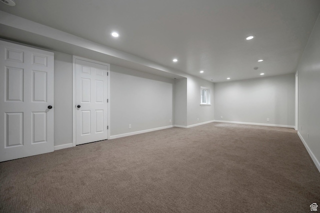 8483 S Terrace Dr, Sandy, UT 84093 - finished below grade area featuring carpet flooring and recessed lighting