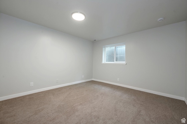 8483 S Terrace Dr, Sandy, UT 84093 - carpeted spare room featuring baseboards and a smoke detector