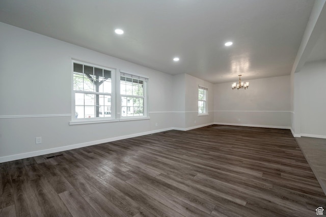 8483 S Terrace Dr, Sandy, UT 84093 - spare room featuring a chandelier, dark wood finished floors, and recessed lighting
