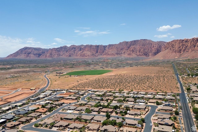 480 W Tonapah Way, Ivins, UT 84738 - aerial overview of property's location featuring a mountain backdrop and nearby suburban area