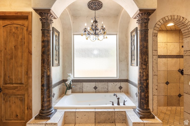 480 W Tonapah Way, Ivins, UT 84738 - full bath featuring a jetted tub, a chandelier, and decorative columns