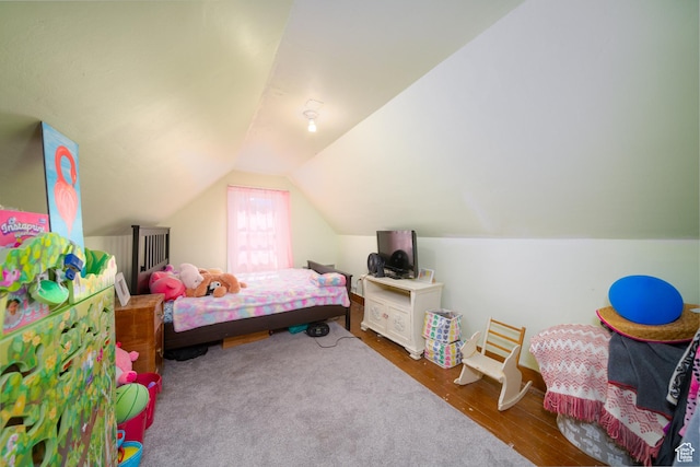 742 N 300 E, Logan, UT 84321 - bedroom with lofted ceiling and wood finished floors