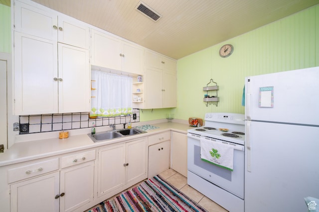 742 N 300 E, Logan, UT 84321 - kitchen with white appliances, open shelves, white cabinets, light countertops, and light tile patterned flooring