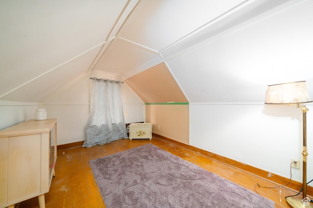 742 N 300 E, Logan, UT 84321 - bonus room featuring wood finished floors and vaulted ceiling