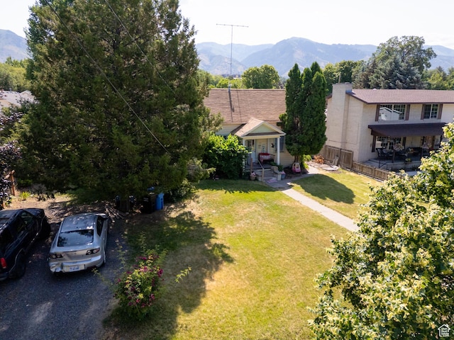 742 N 300 E, Logan, UT 84321 - view of front of home with a mountain view and a front yard