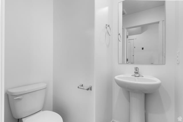 554 W 1870 S Unit 1197, Provo, UT 84601 - half bathroom featuring toilet and a sink
