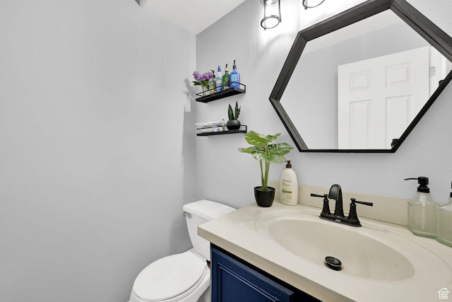 2221 W Davenshire Ln, Taylorsville, UT 84129 - half bathroom with toilet and vanity