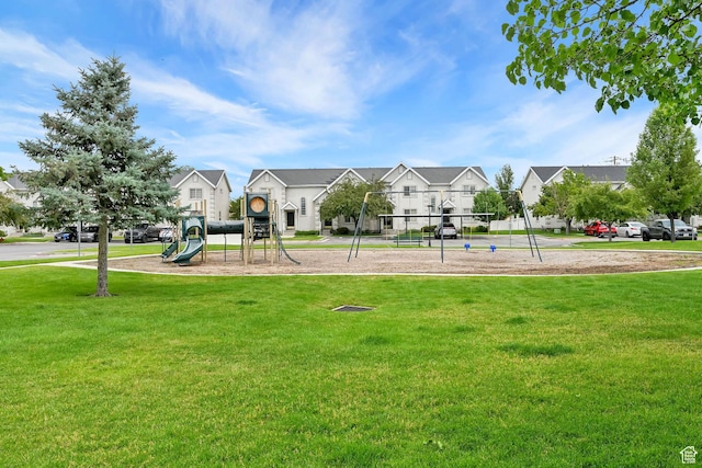 2221 W Davenshire Ln, Taylorsville, UT 84129 - community play area with a yard and a residential view