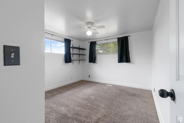 3310 S 3200 W, West Valley City, UT 84119 - carpeted empty room featuring a ceiling fan and healthy amount of natural light