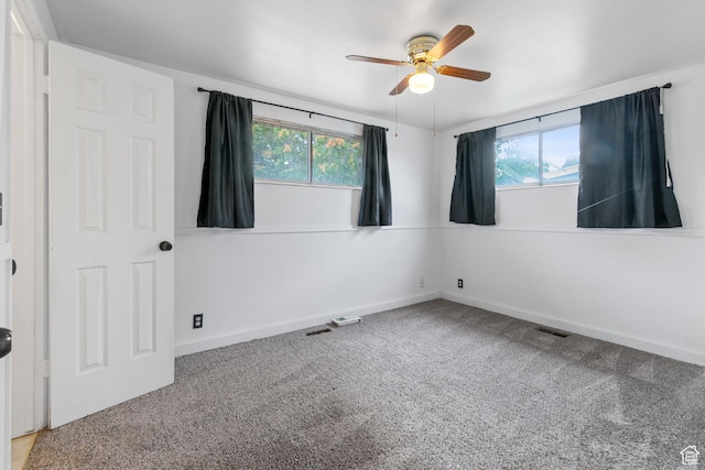 3310 S 3200 W, West Valley City, UT 84119 - carpeted empty room with healthy amount of natural light and ceiling fan