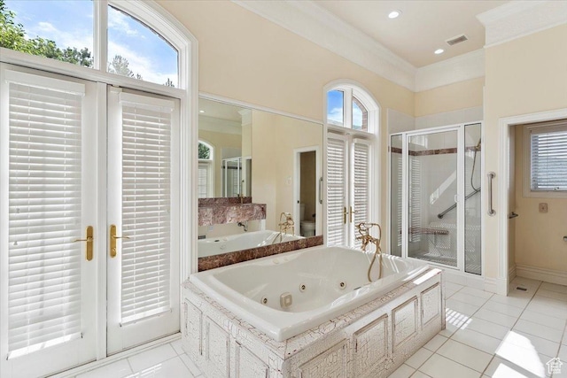 3356 Twin Peaks Cir, Layton, UT 84040 - bathroom featuring a shower stall, a whirlpool tub, tile patterned floors, and crown molding