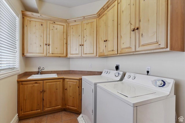 3356 Twin Peaks Cir, Layton, UT 84040 - washroom featuring independent washer and dryer, cabinet space, plenty of natural light, and light tile patterned floors