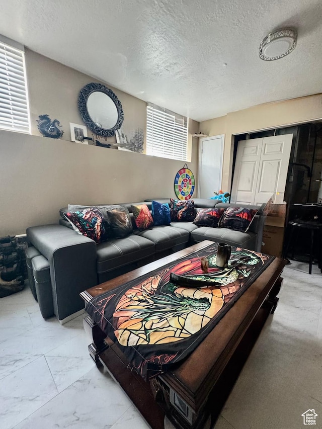 1360 W 7305 S, West Jordan, UT 84084 - living room featuring a textured ceiling and light marble finish flooring