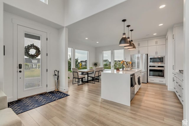 11536 S Allerton Dr, South Jordan, UT 84009 - foyer entrance with light wood-style flooring and recessed lighting