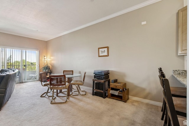 838 E S Temple S Unit 409, Salt Lake City, UT 84102 - carpeted dining area featuring crown molding and baseboards