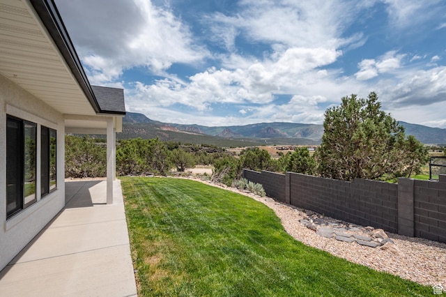 3127 W 2350 S, Cedar City, UT 84720 - view of yard with a mountain view and a patio area
