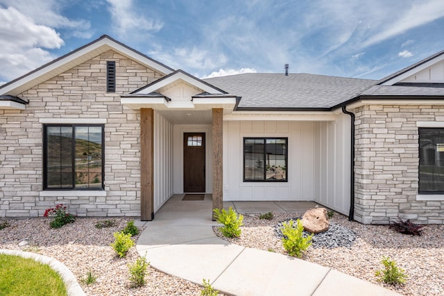 3127 W 2350 S, Cedar City, UT 84720 - view of front of house featuring board and batten siding, roof with shingles, and stone siding