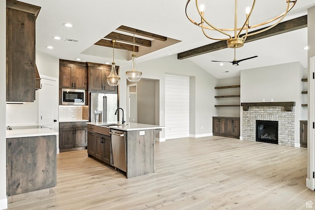 3127 W 2350 S, Cedar City, UT 84720 - kitchen featuring appliances with stainless steel finishes, dark brown cabinetry, light countertops, backsplash, and recessed lighting