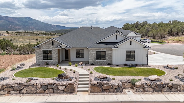 3127 W 2350 S, Cedar City, UT 84720 - modern inspired farmhouse with stone siding, board and batten siding, a shingled roof, and a front yard
