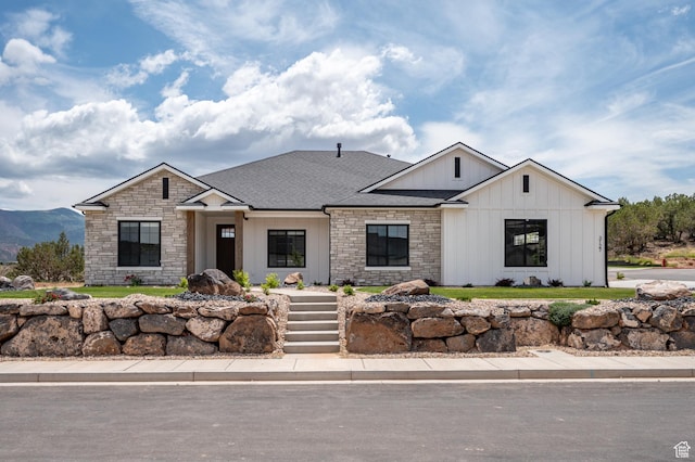 3127 W 2350 S, Cedar City, UT 84720 - view of front of home with stone siding, board and batten siding, and roof with shingles