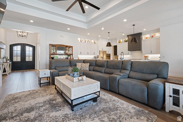2616 S 3210 E, St George, UT 84790 - living room with wood finished floors, ceiling fan, a chandelier, recessed lighting, and french doors