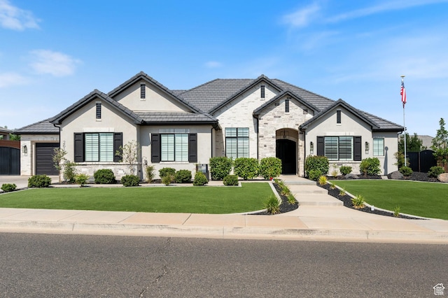 2616 S 3210 E, St George, UT 84790 - french country inspired facade with stone siding, stucco siding, and a front yard