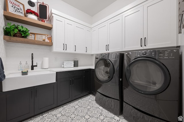 2616 S 3210 E, St George, UT 84790 - laundry room featuring cabinet space, independent washer and dryer, and light tile patterned floors