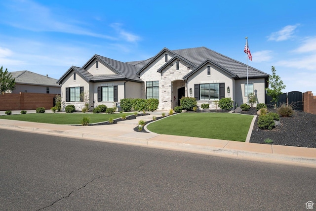 2616 S 3210 E, St George, UT 84790 - french country home featuring stone siding, stucco siding, and a tiled roof