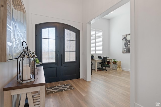 2616 S 3210 E, St George, UT 84790 - entrance foyer with arched walkways, wood finished floors, and french doors