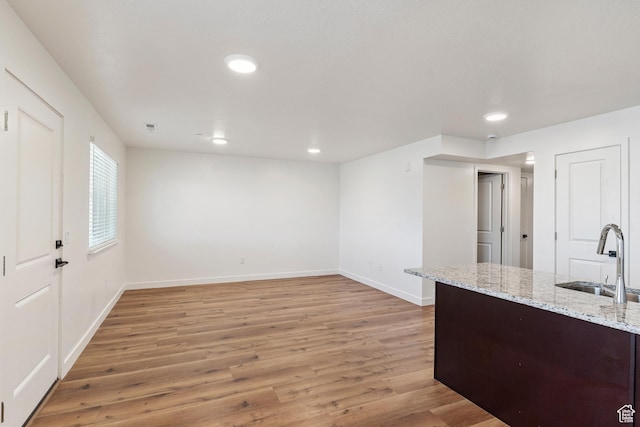 456 W Main N, Santaquin, UT 84655 - kitchen with light wood-type flooring, recessed lighting, and light stone countertops