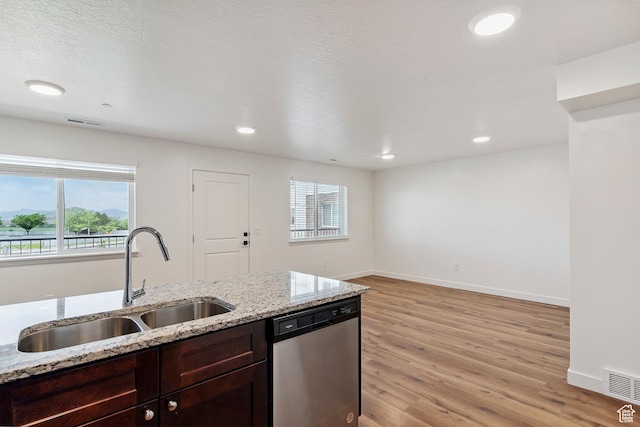 456 W Main N, Santaquin, UT 84655 - kitchen with dishwasher, light wood-style flooring, dark brown cabinets, light stone countertops, and recessed lighting