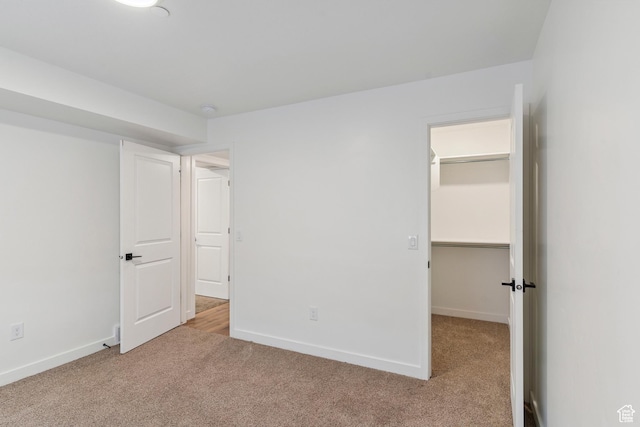 456 W Main N, Santaquin, UT 84655 - unfurnished bedroom with carpet flooring, a spacious closet, and a closet
