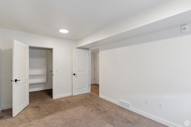 456 W Main N, Santaquin, UT 84655 - unfurnished bedroom featuring carpet floors, a spacious closet, and a closet