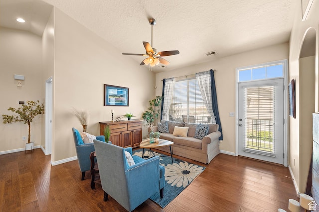 6391 W Passenger Ct S, West Jordan, UT 84081 - living area with healthy amount of natural light, wood finished floors, a ceiling fan, recessed lighting, and a textured ceiling