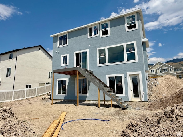 565 S 1140 E Unit 1203, Smithfield, UT 84335 - rear view of house featuring stairway and stucco siding