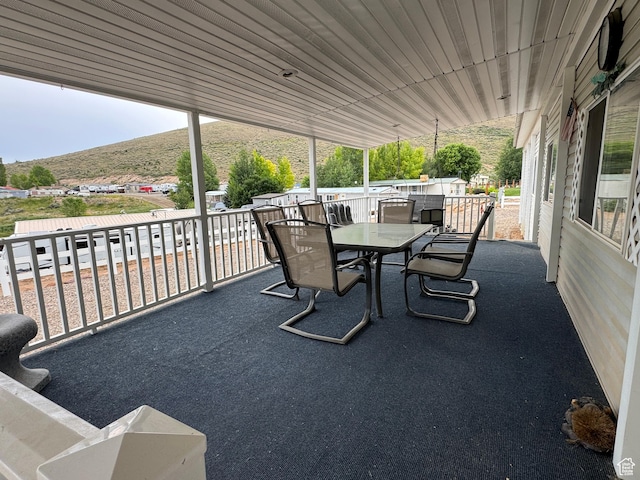 738 E Vanessa Ln Unit 386, Garden City, UT 84028 - patio / terrace with outdoor dining area and a mountain view