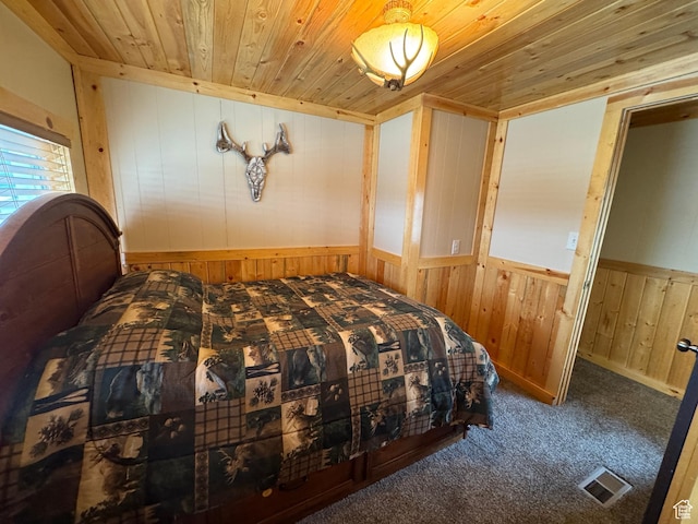 738 E Vanessa Ln Unit 386, Garden City, UT 84028 - bedroom with wooden walls, wooden ceiling, carpet flooring, and a wainscoted wall