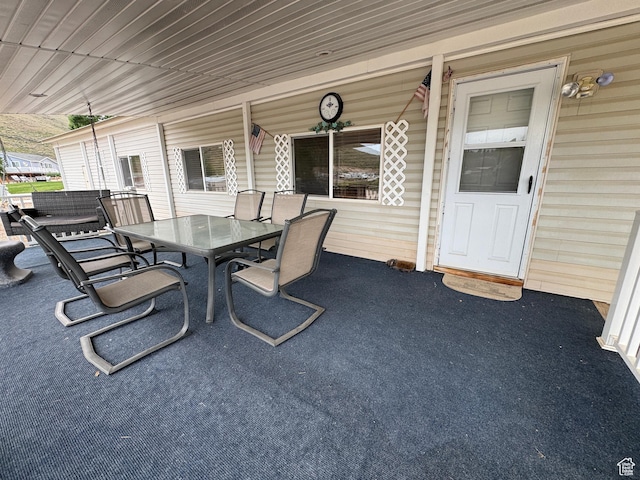 738 E Vanessa Ln Unit 386, Garden City, UT 84028 - view of patio / terrace featuring outdoor dining space