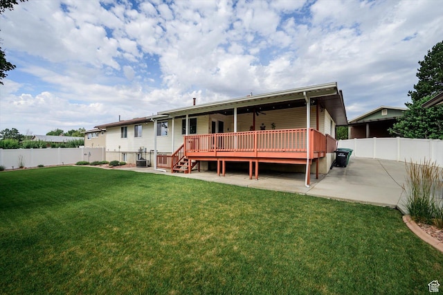 6871 S Alfalfa Cir, West Jordan, UT 84084 - rear view of property featuring a fenced backyard, a wooden deck, ceiling fan, and a patio area