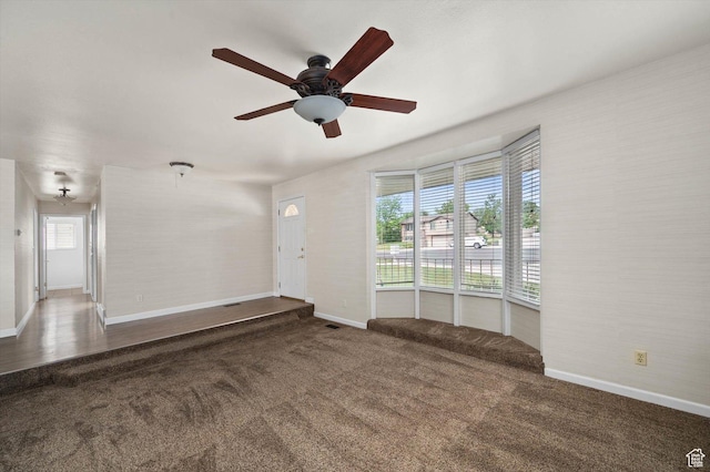 6871 S Alfalfa Cir, West Jordan, UT 84084 - spare room featuring carpet floors, a ceiling fan, and healthy amount of natural light
