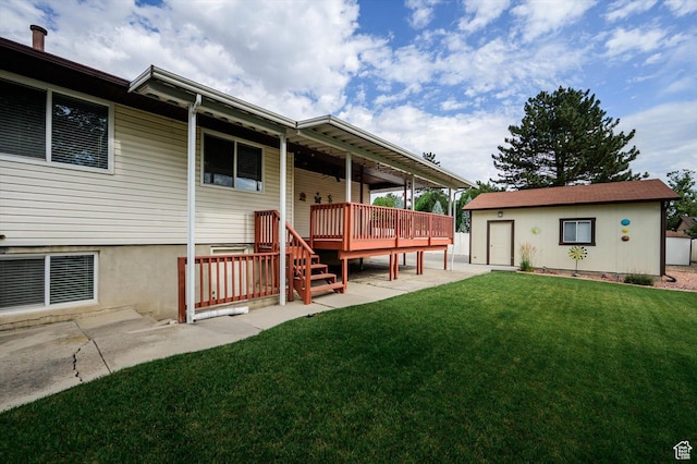 6871 S Alfalfa Cir, West Jordan, UT 84084 - rear view of property with a lawn, a wooden deck, and an outbuilding
