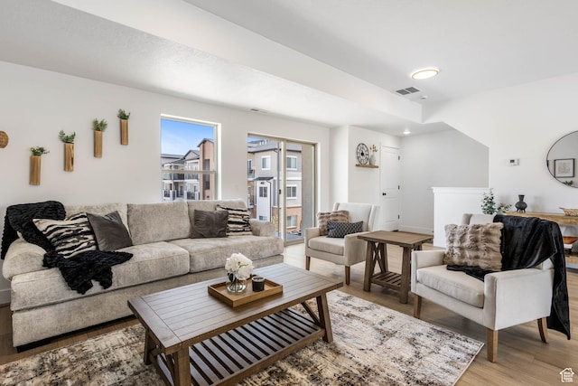588 W Caroles Way Unit 13, Tooele, UT 84074 - living room featuring light wood-style flooring