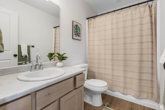 588 W Caroles Way Unit 13, Tooele, UT 84074 - bathroom featuring vanity, wood finished floors, and shower / bath combo