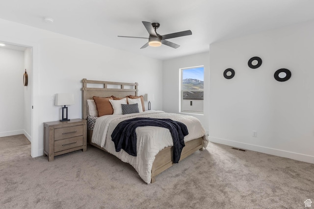 588 W Caroles Way Unit 13, Tooele, UT 84074 - bedroom featuring light carpet and ceiling fan