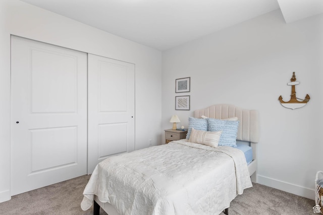 588 W Caroles Way Unit 13, Tooele, UT 84074 - carpeted bedroom featuring a closet and baseboards